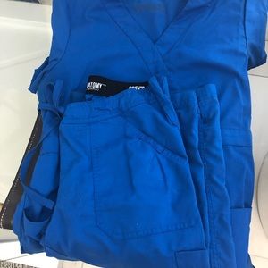 Seven pairs of Grey’s anatomy scrubs